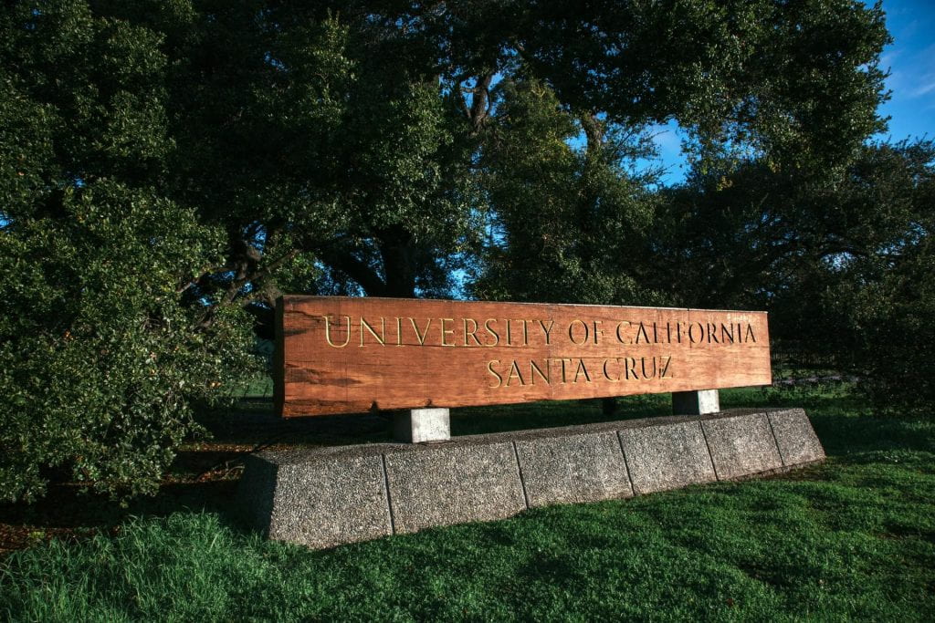 The wooden welcome sign to the University of California Santa Cruz.